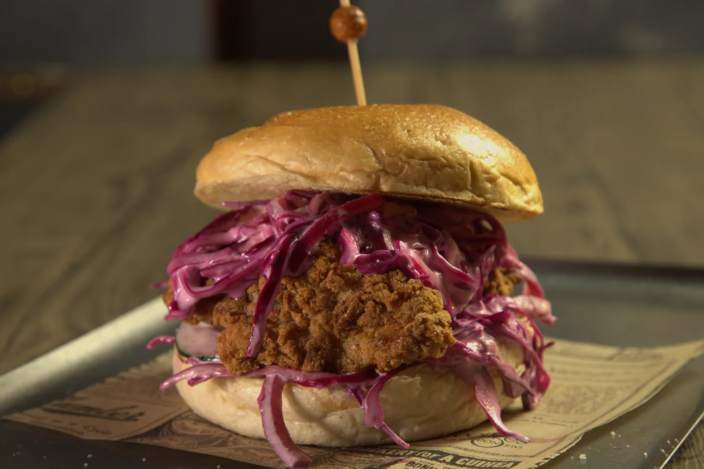 Portitxol — Crispy chicken, slaw, onion, mango chutney, pickles, mayo